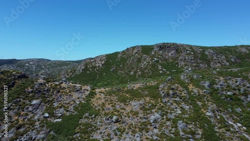 Drone flying around la curota near Ribeira Spain with mountain views photo