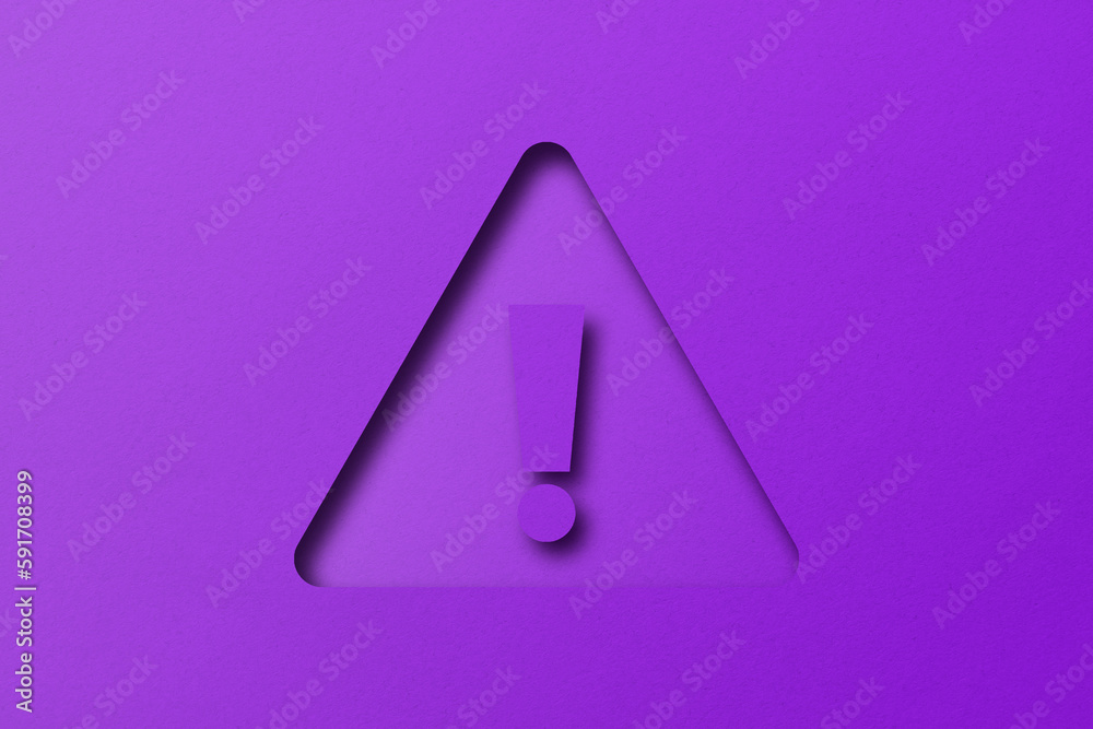 Purple paper punched into the shape of an exclamation mark. warning sign set on purple paper background Purple paper punched into the shape of an exclamation mark. warning sign set on purple paper background