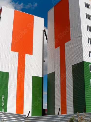 Gable end of multistory apartment house. Urban landscape. Contemporary architecture. Ust-Kamenogorsk, kz. 2021.