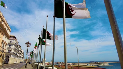 Algerian flag in the boulvard of the seafront of Algiers - SLOW MOTION photo