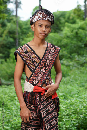 Men portrait wear traditional clothes from Sabu island, east nusa tenggara, Indonesia photo