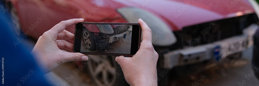 Female insurance broker making photos of car after accident on modern smartphone - obrazy, fototapety, plakaty 