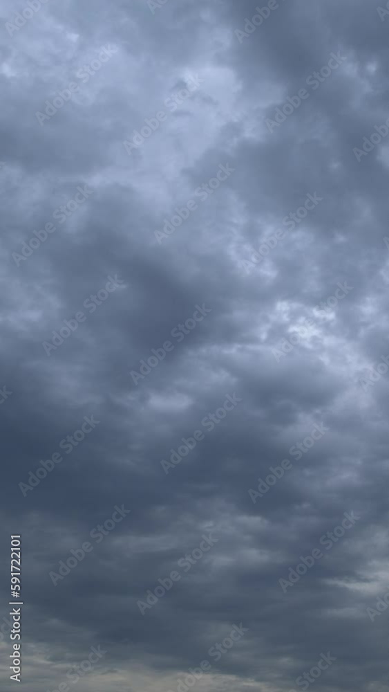 Dramatic sky with storm cloud on a cloudy day vertical video time lapse. Dramatic sky with storm cloud on a cloudy day vertical video time lapse.