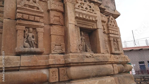 Outer wall of an Ancient Hindu Shiv Temple of Gurjara Pratihara era in a village of central India near Gohad Madhya Pradesh photo