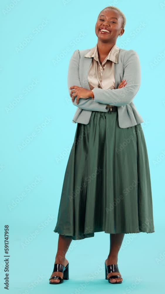 Arms crossed, business and fashion with black woman in studio for confident, professional and empowerment. Happy, smile and pride with female on blue background for executive, entrepreneur and style Arms crossed, business and fashion with black woman in studio for confident, professional and empowerment. Happy, smile and pride with female on blue background for executive, entrepreneur and style
