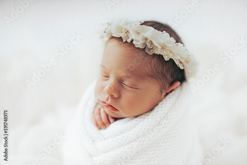 Closeup portrait of newborn baby girl