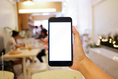 Close up of women's hands holding cell telephone blank copy space screen. smart phone with technology concept