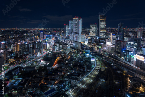 Nagoya station and its vicinity downtown area with high rise buildings at night.
