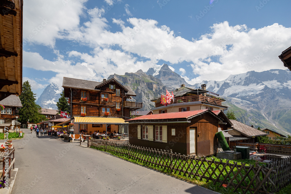 Traditional wooden houses in Murren, a traditional Walser mountain village in the Bernese Highlands of Switzerland, halfway up the Schilthorn Mountain.