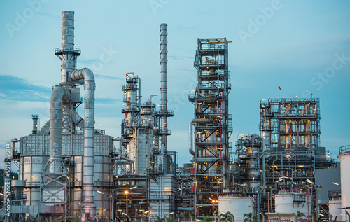 Oil​ refinery​ and​ plant and tower column of Petrochemistry industry in oil​ and​ gas​ ​industrial with​ cloud​ red ​sky