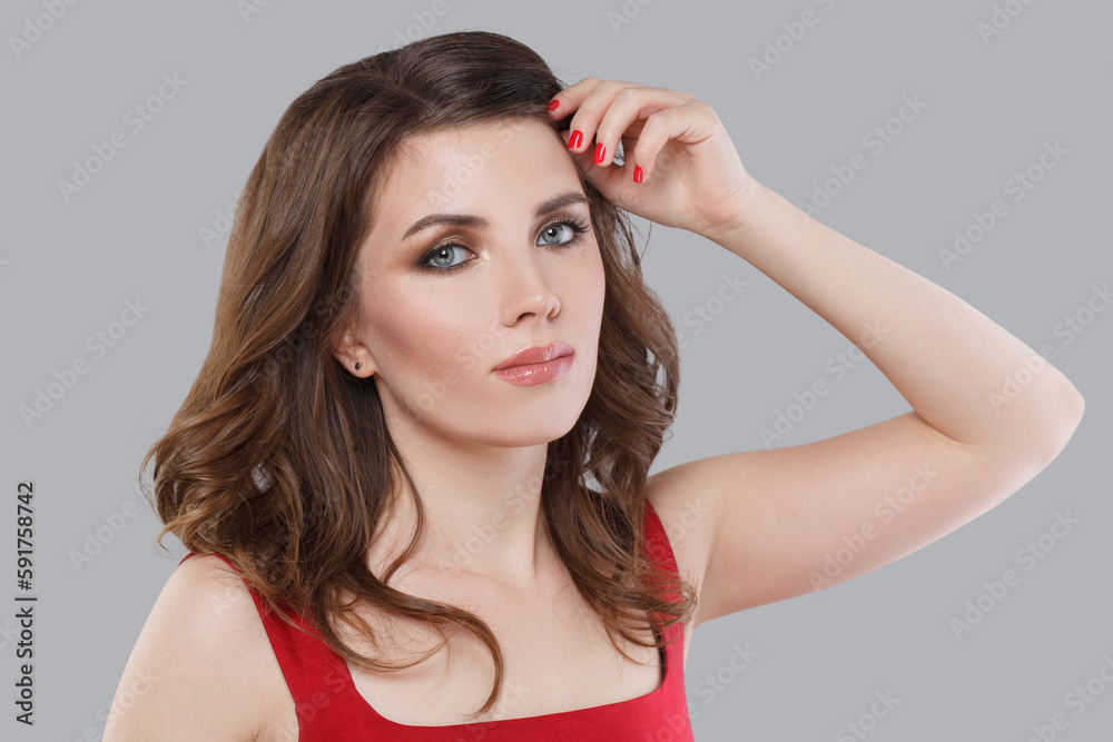 Fototapeta premium Pretty young adult woman looking at camera, fashion beauty portrait