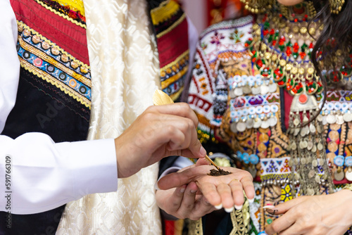 Afghani pre wedding henna heena night ceremony rituals hands close up