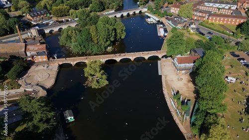 Aerial view flying over Clopton historical town archway canal bridge, Stratford Upon Avon, England photo