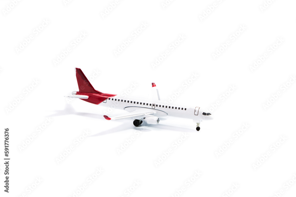 Toy plane on a white background. Travel concept