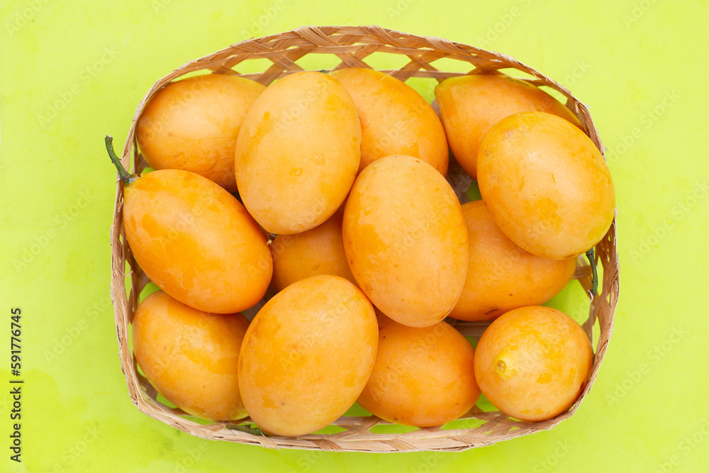 Marian plum fruit isolated on green background Marian plum fruit isolated on green background
