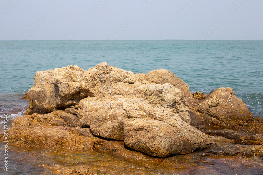 Rocks with sea and blue sky