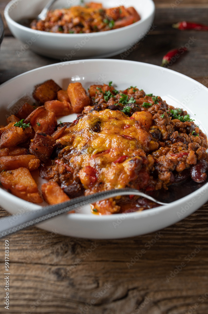Mexican bean stew with cheddar cheese crust and sweet potatoes Mexican bean stew with cheddar cheese crust and sweet potatoes
