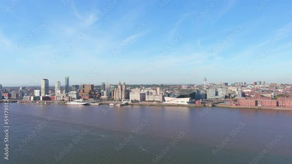 Liverpool, UK: Aerial view of famous city and seaport in England, skyline of Liverpool City Centre with high-rise buildings, sunny summer day - landscape panorama of United Kingdom from above Liverpool, UK: Aerial view of famous city and seaport in England, skyline of Liverpool City Centre with high-rise buildings, sunny summer day - landscape panorama of United Kingdom from above