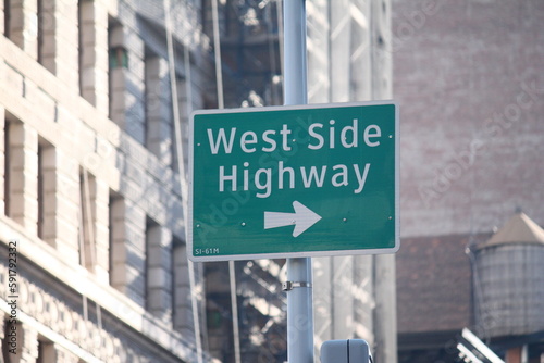 Green West Side Highway direction traffic sign in Manhattan in New York City © willeye