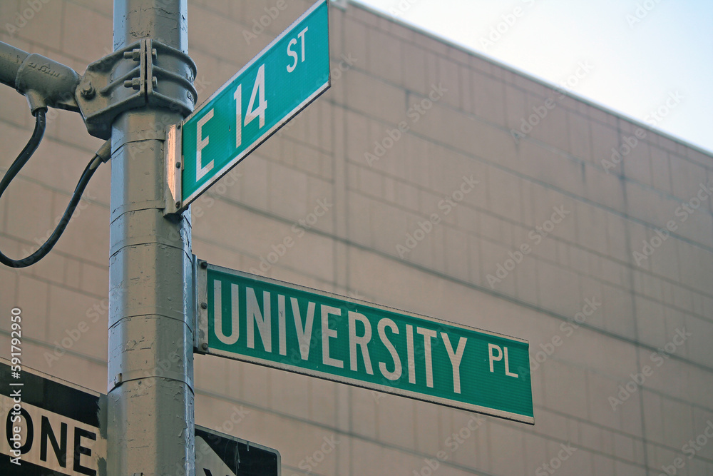 Green East 14th Street and University Place traditional sign in Midtown Manhattan