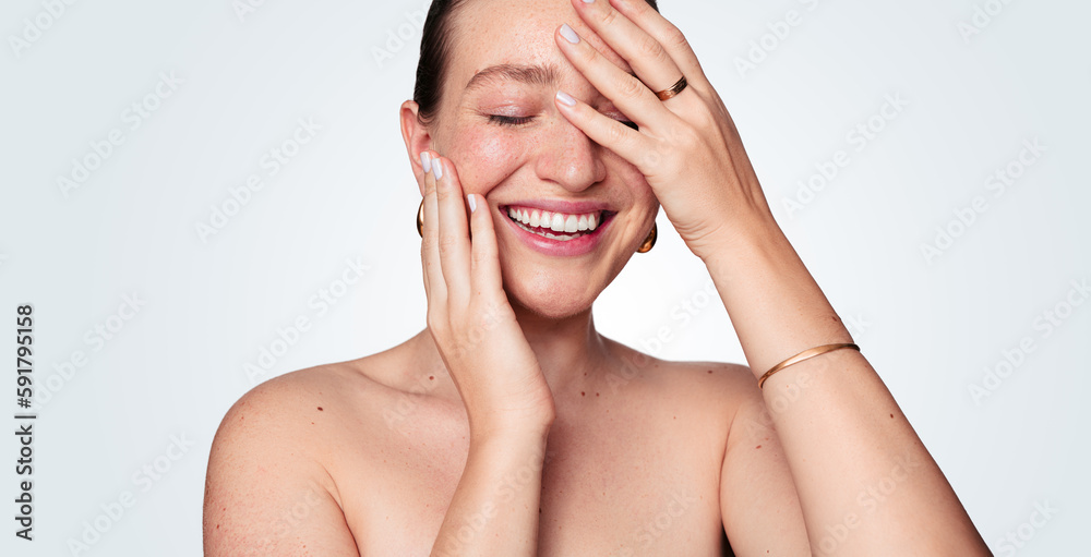 Fototapeta premium Crop smiling woman touching clean skin on face