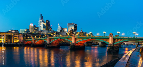 Night in London, Southwark Bridge ane Skyscrapers over River Thames, London, England