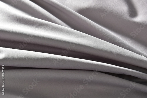 the fabric is natural and gray for the background