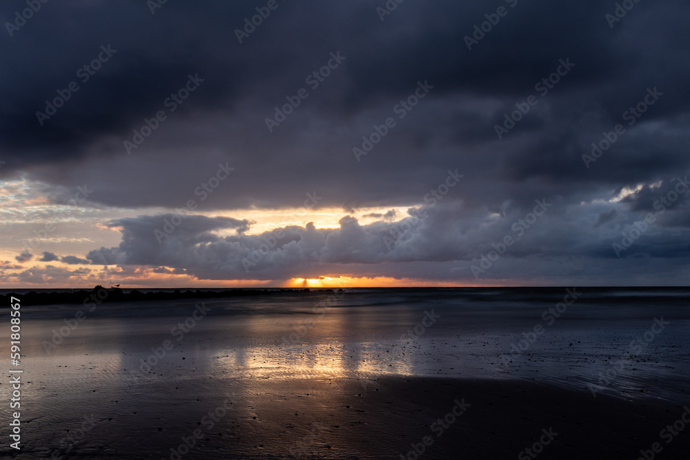 Dramatic sky during sunset beach view