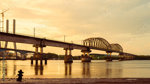 Beautiful view of the Zuari Railway Bridge during sunrise