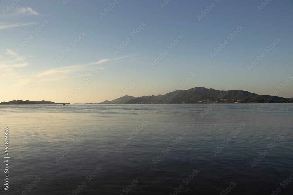 Fototapeta premium sunset over the river