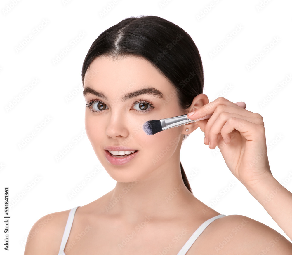 Teenage girl with makeup brush on white background Teenage girl with makeup brush on white background
