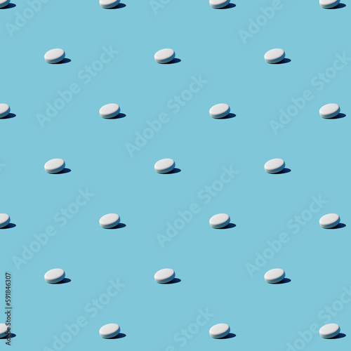 White pills on a blue background. Seamless pattern for background. Flat design medical pharmacy for website presentation packaging, flyer, business card cover.