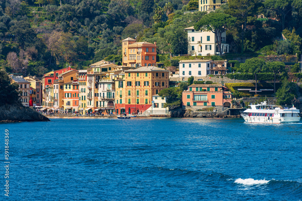 Famous village of Portofino, luxury tourist resort in Genoa Province, Liguria, Italy, Europe. Port and colorful houses, Mediterranean sea (Ligurian sea).