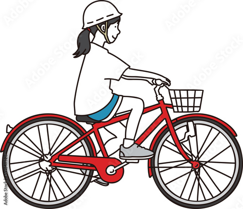 ヘルメットを被って自転車に乗る女の子