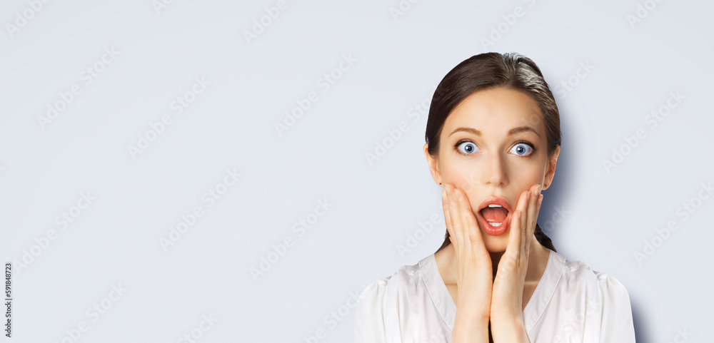 Wow! Excited surprised, astonished very happy woman. Brunette girl with wide opened eyes, open mouth, raised hands. Unbelievable sales, rebates offer, discounts deal ad. Light grey gray background. Wow! Excited surprised, astonished very happy woman. Brunette girl with wide opened eyes, open mouth, raised hands. Unbelievable sales, rebates offer, discounts deal ad. Light grey gray background.