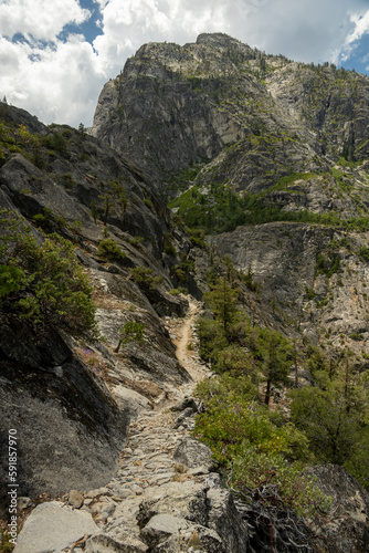 Narrow Trail Cut Into The Cliff Side In Backcountry of Yosemite
