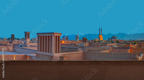 One of the most attractions of Iran or Yazd city is its Jame Mosque (Friday Mosque) at dusk - Yazd, Iran - UNESCO World Heritage Site 