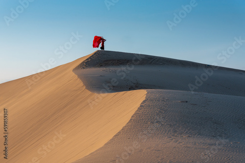 Tourist visit Nam Cuong sand dune, Ninh Thuan, Vietnam photo