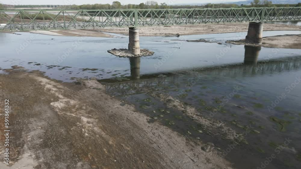 Europe, Italy, Pavia Drought and aridity river - Po and Ticino , dry beach of sand and water shortage, water emergency in Lombardy - Drone view in Ponte della Becca - Climate change global warming Europe, Italy, Pavia Drought and aridity river - Po and Ticino , dry beach of sand and water shortage, water emergency in Lombardy - Drone view in Ponte della Becca - Climate change global warming
