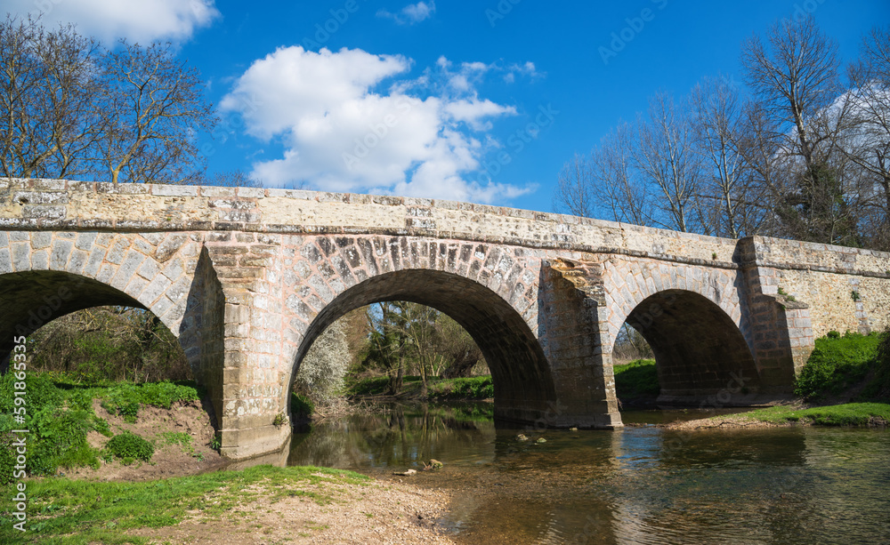 Roman bridge on old royal road from Paris to Sens over Yerres river near Evry-Gregy-sur-Yerre and medieval town of Brie-Comte-Robert. Built in 17th-18th c. recalls architects name, Romains brothers