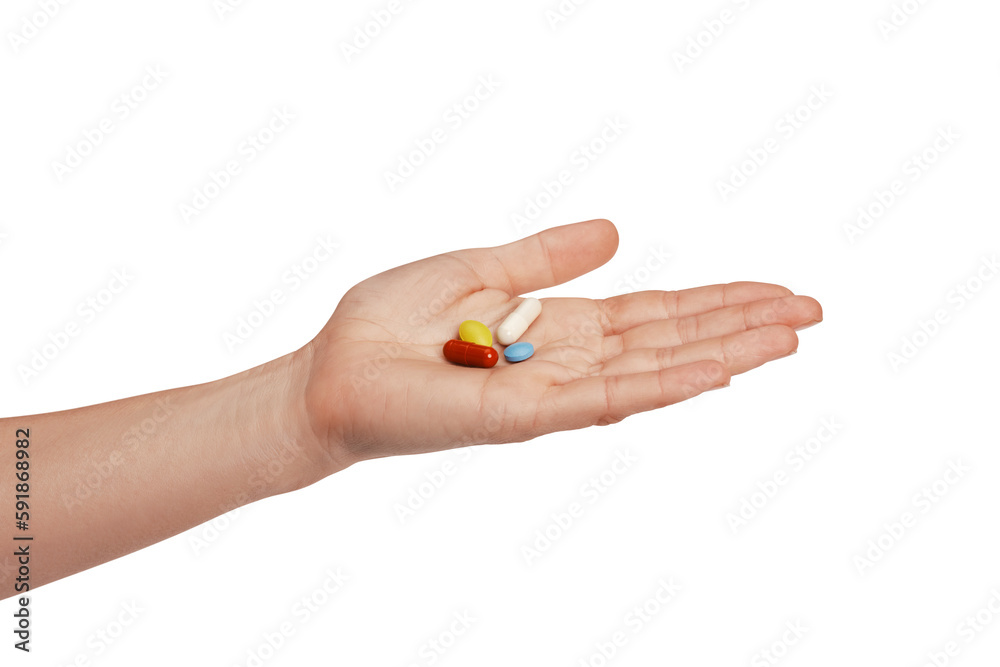 Colorful pills and tablets in the woman hand Colorful pills and tablets in the woman hand