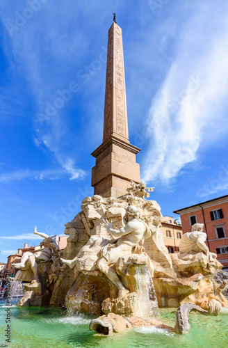 Fountain of Four Rivers (Fontana dei Quattro Fiumi) with obelisk on Navona square, Rome, Italy