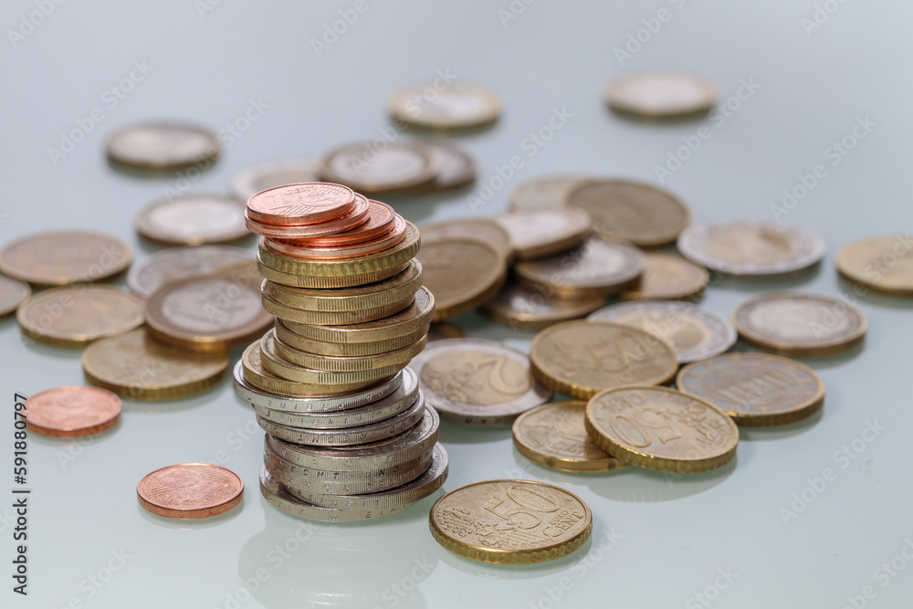 Closeup shot of pile of Euro coins and stack Closeup shot of pile of Euro coins and stack