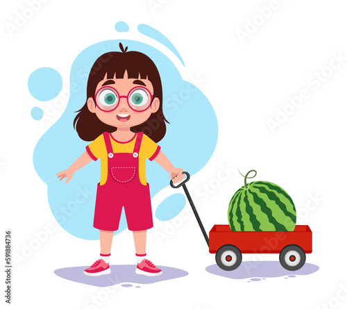 Cute child with cart and watermelon