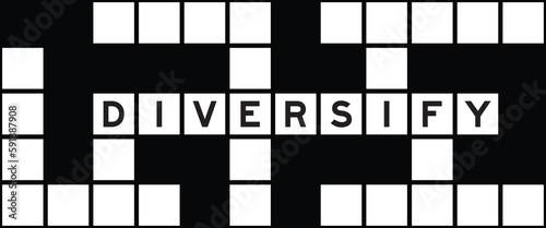 Alphabet letter in word diversify on crossword puzzle background