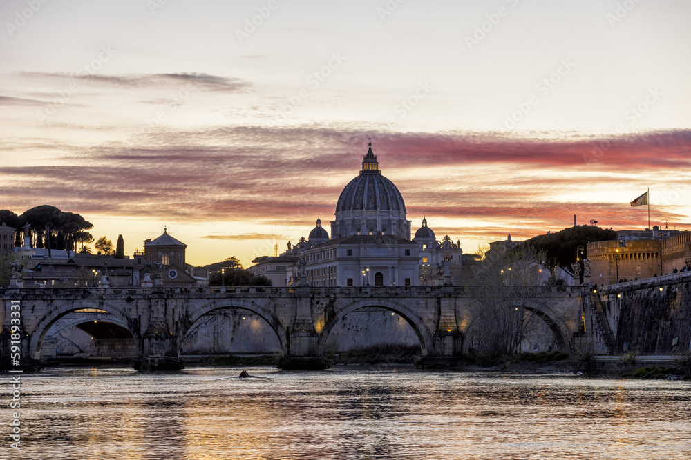 4K in movement of Majestic sunset landscape of Rome, Italy, featuring the Ponte Sant'Angelo, the river Tiber, and St Peter's Basilica in the Vatican. Amazing light cloud sky and Clouds move