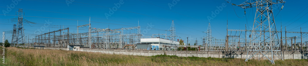 High power electricity poles in urban area. Energy electricity transmission, high voltage supply. Power Lines High power electricity poles in urban area. Energy electricity transmission, high voltage supply. Power Lines