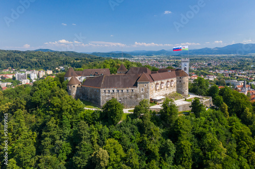 Ljubljana Castle and old town in Slovenia. Ljubljana is the largest city. It's known for its university population and green spaces, including expansive Tivoli Park. The curving Ljubljanica River