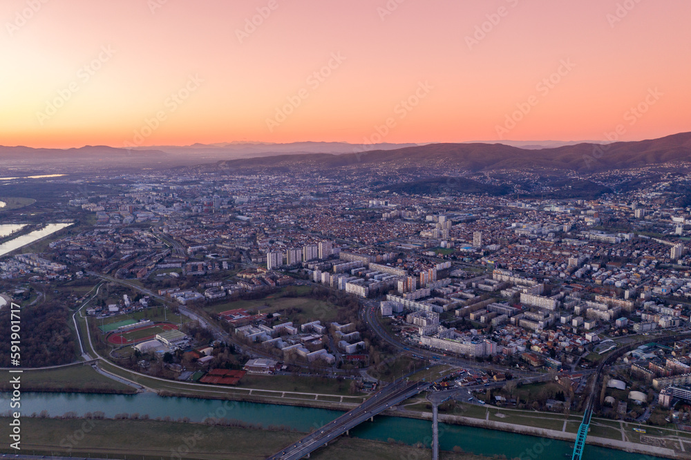 Fototapeta premium Zagreb Cityscape and Mountains in Background. Croatia. Beautiful Evening Sunset Light
