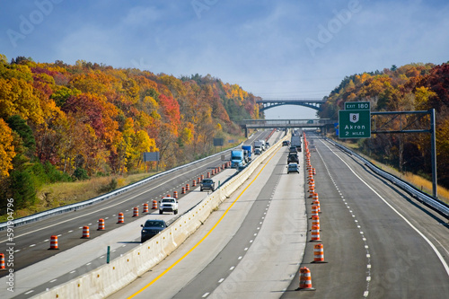 The Ohio Turnpike below a landmark overpass above the Cuyahoga Valley amid vivid autumn colors